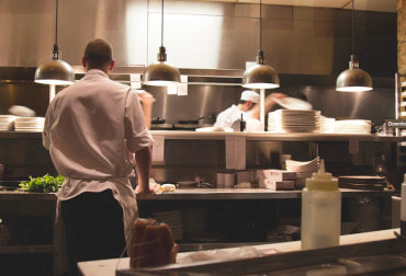 Scene from an open kitchen in a London restaurant